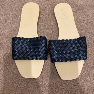 Black leather flat sandals